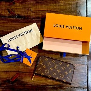 LV Zippy Wallet - beautiful red inside! Minimally used. Excellent used condition